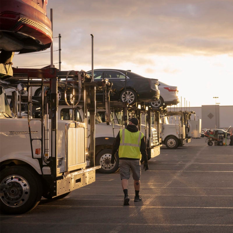 employee on inspection center lot