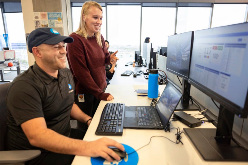 employees collaborating in office