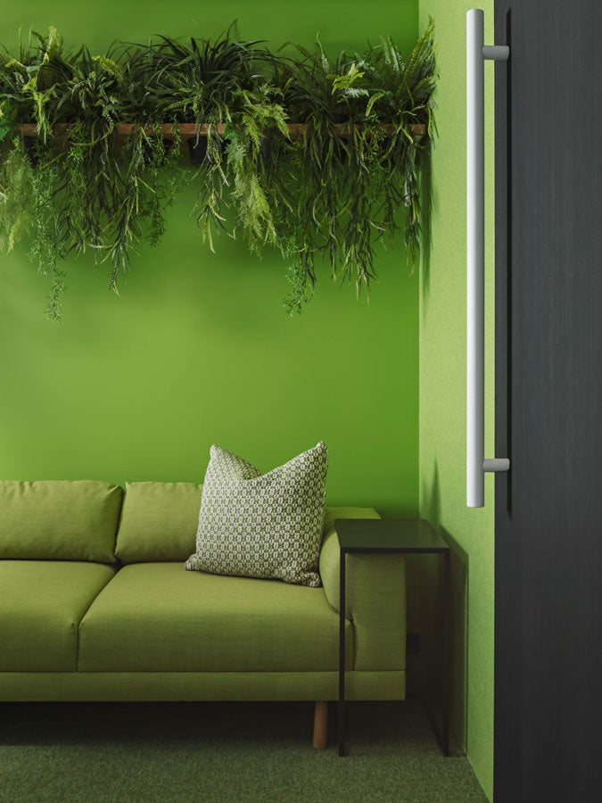 Green Couch and Work Space